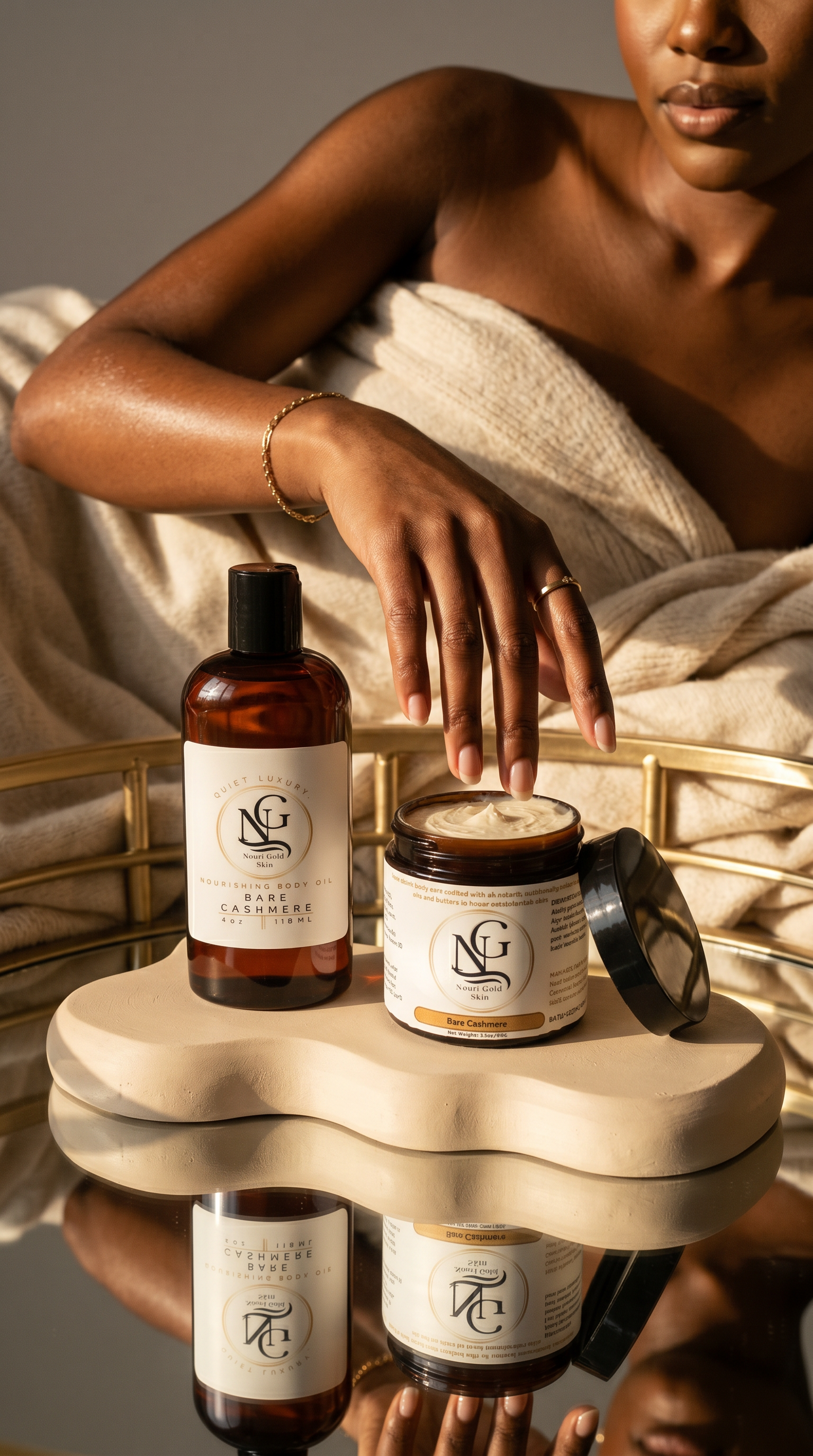 Woman applying cream to her hand with NGC skincare products on a reflective surface.