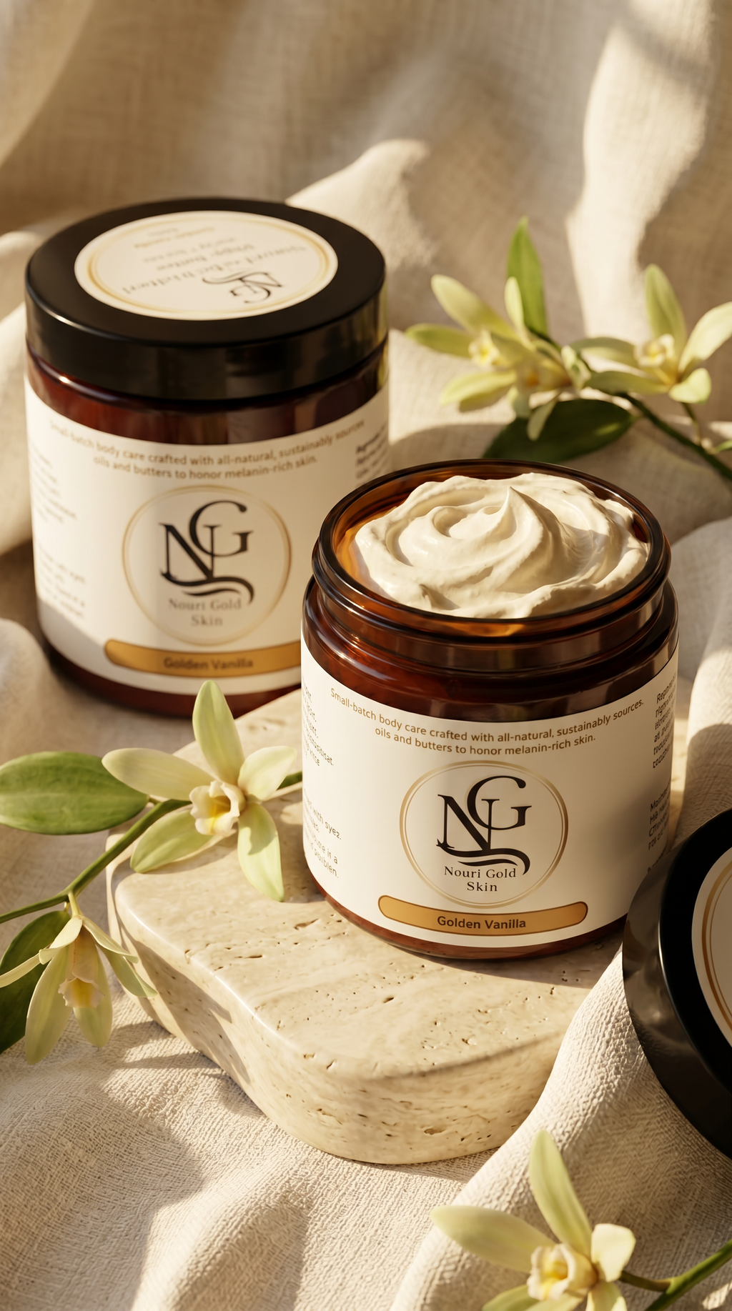 Two jars of NG cream on a textured surface with vanilla flowers.